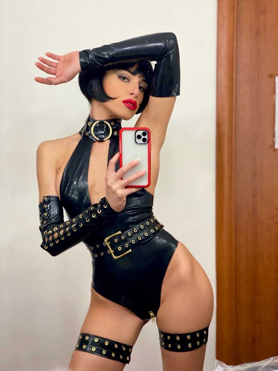 Latex Krystal bodysuit in Black and Gold. Belt not included.
