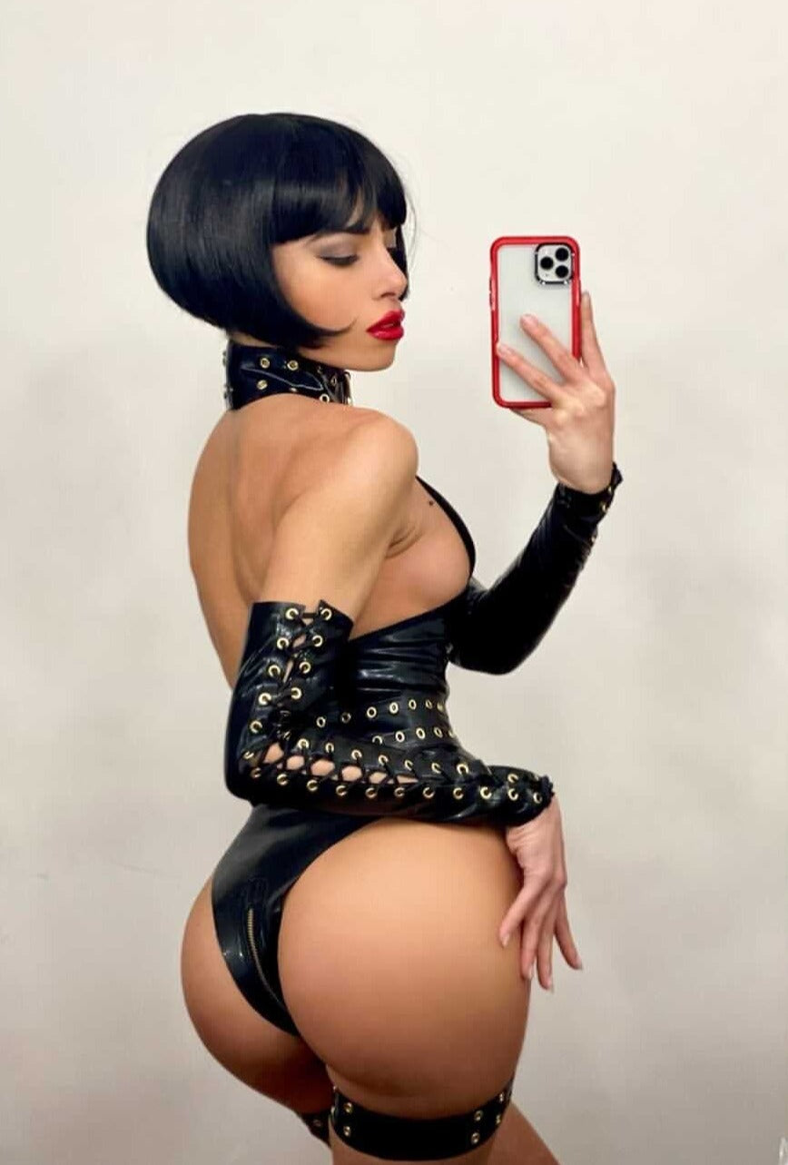 Latex Krystal bodysuit in Black and Gold. Belt not included.