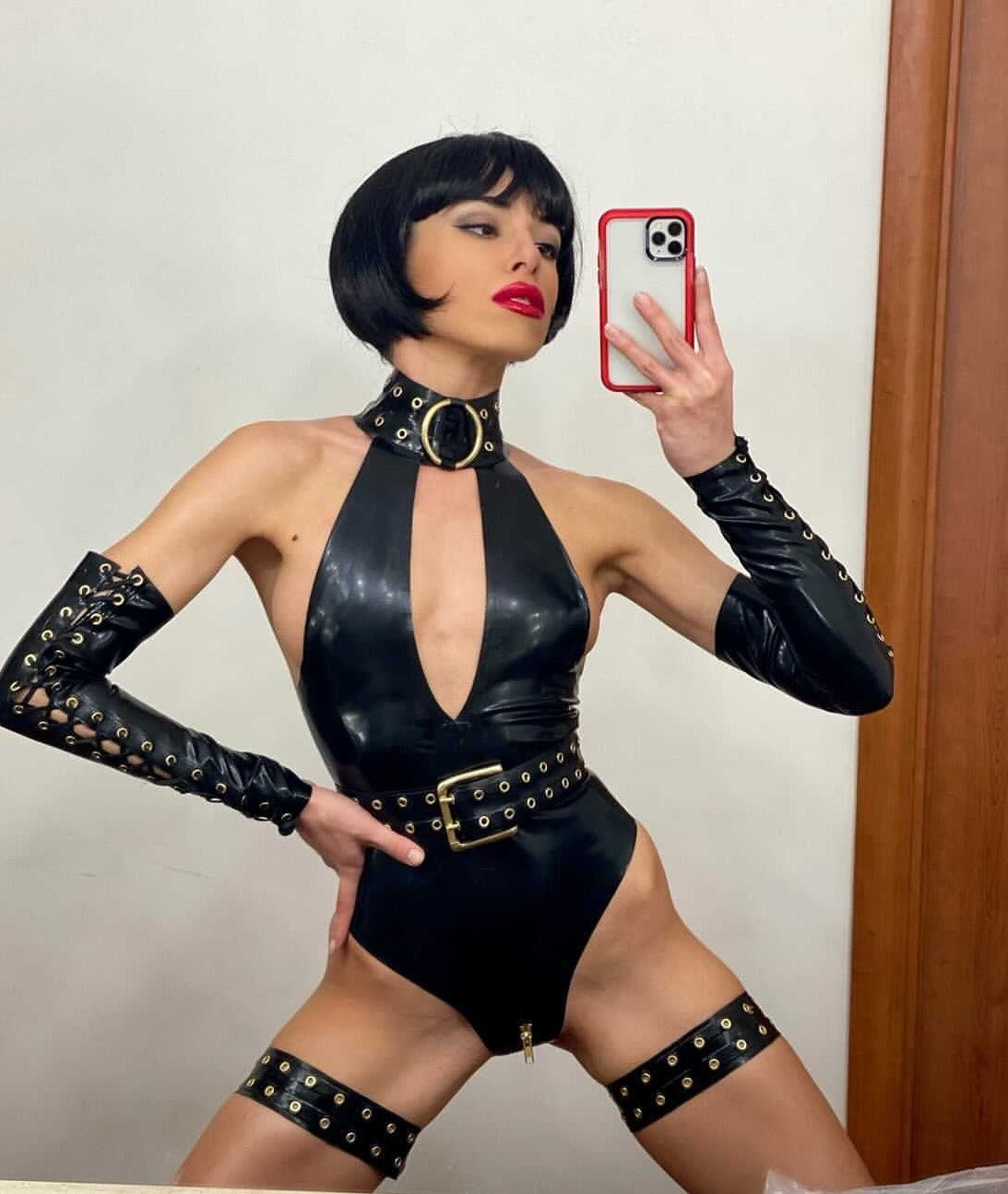 Latex Krystal bodysuit in Black and Gold. Belt not included.