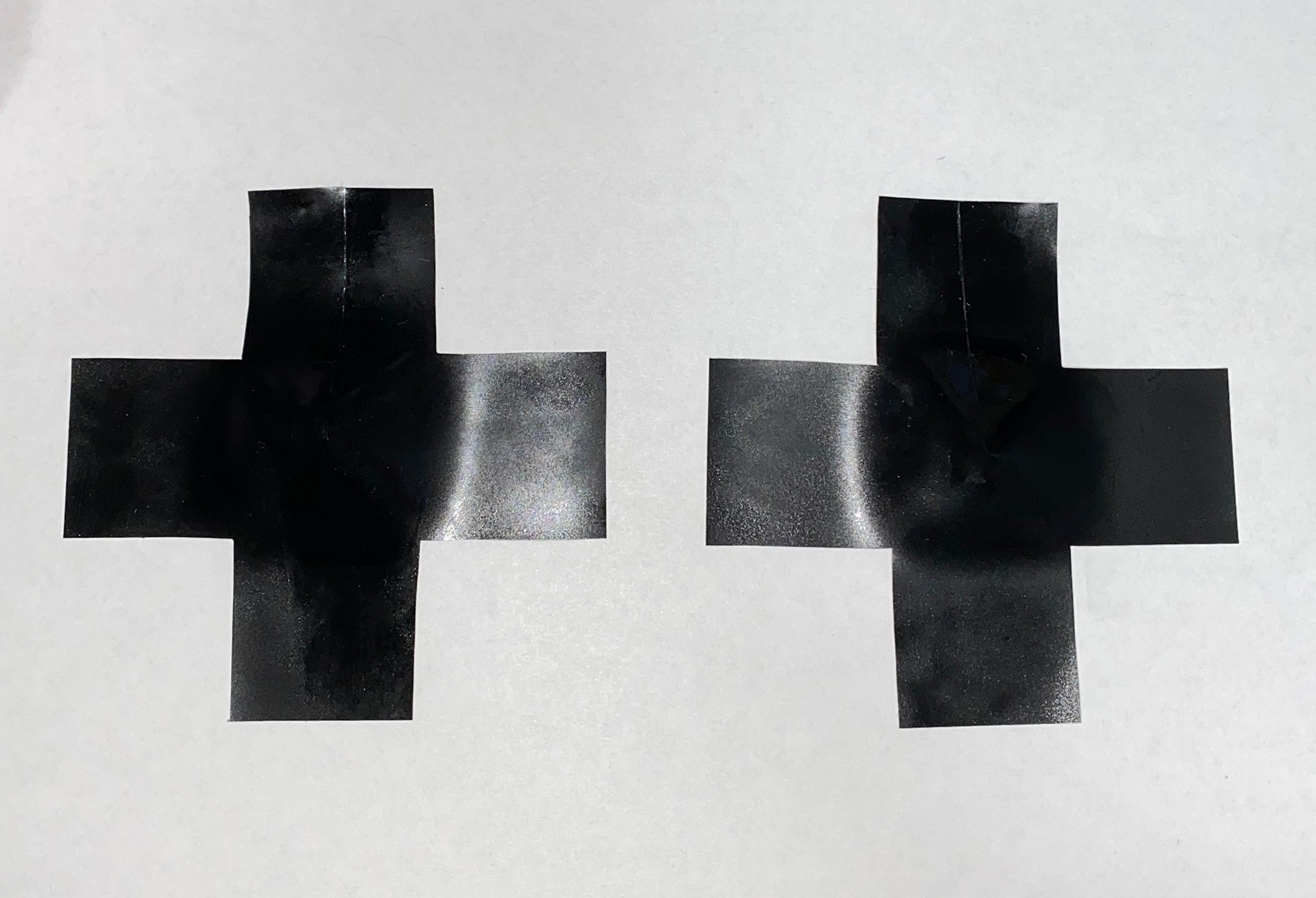 Latex Cross pasties (a pair).