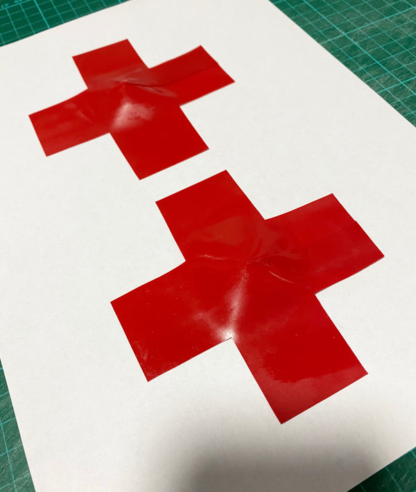 Latex Cross pasties (a pair).